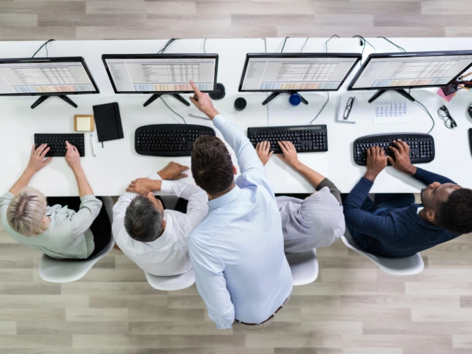 Noveritis team in a multilingual business meeting